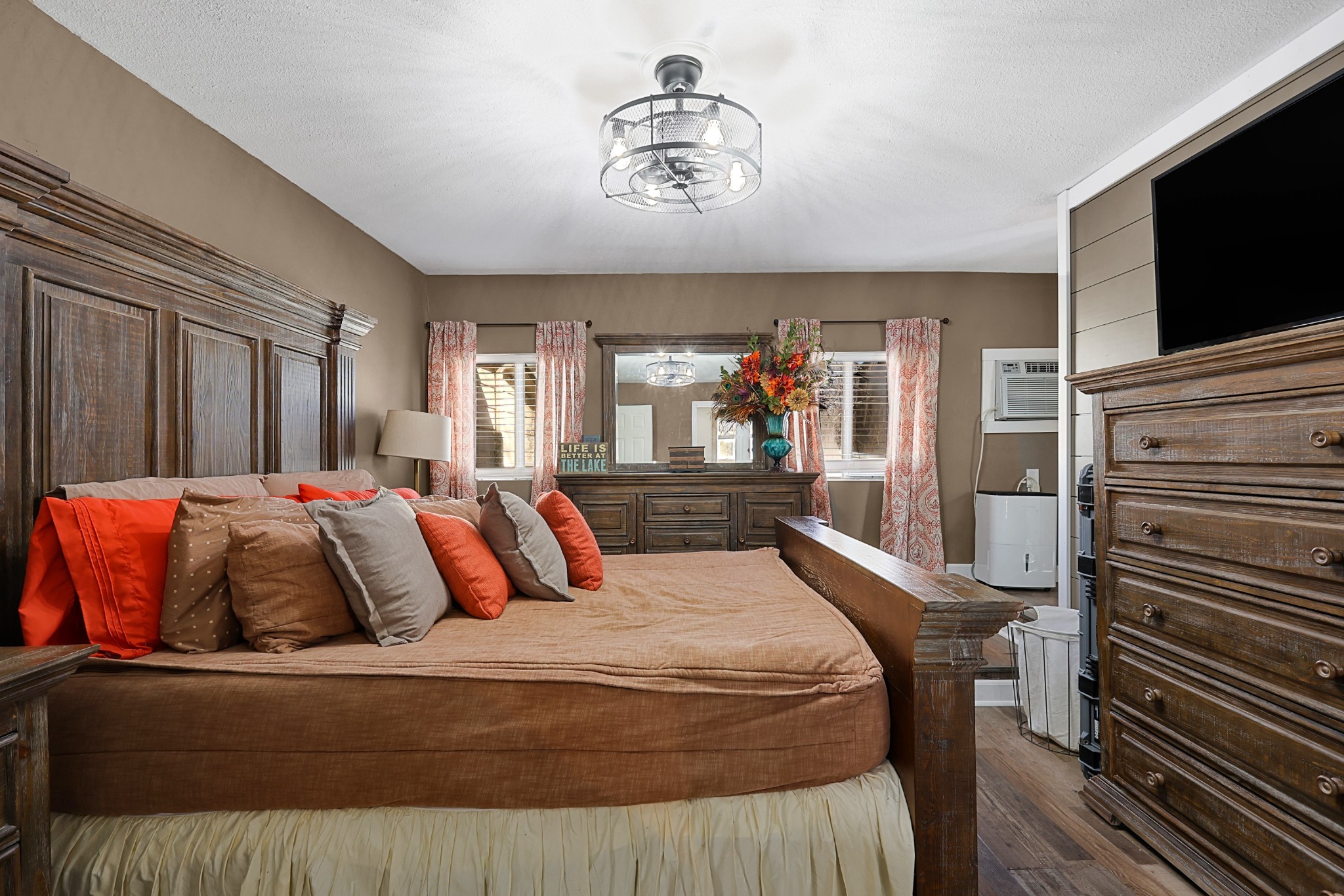 80 Woody Lane Springville, TN 38256 - Photo 12 of 31 a bedroom with a bed and flat screen tv