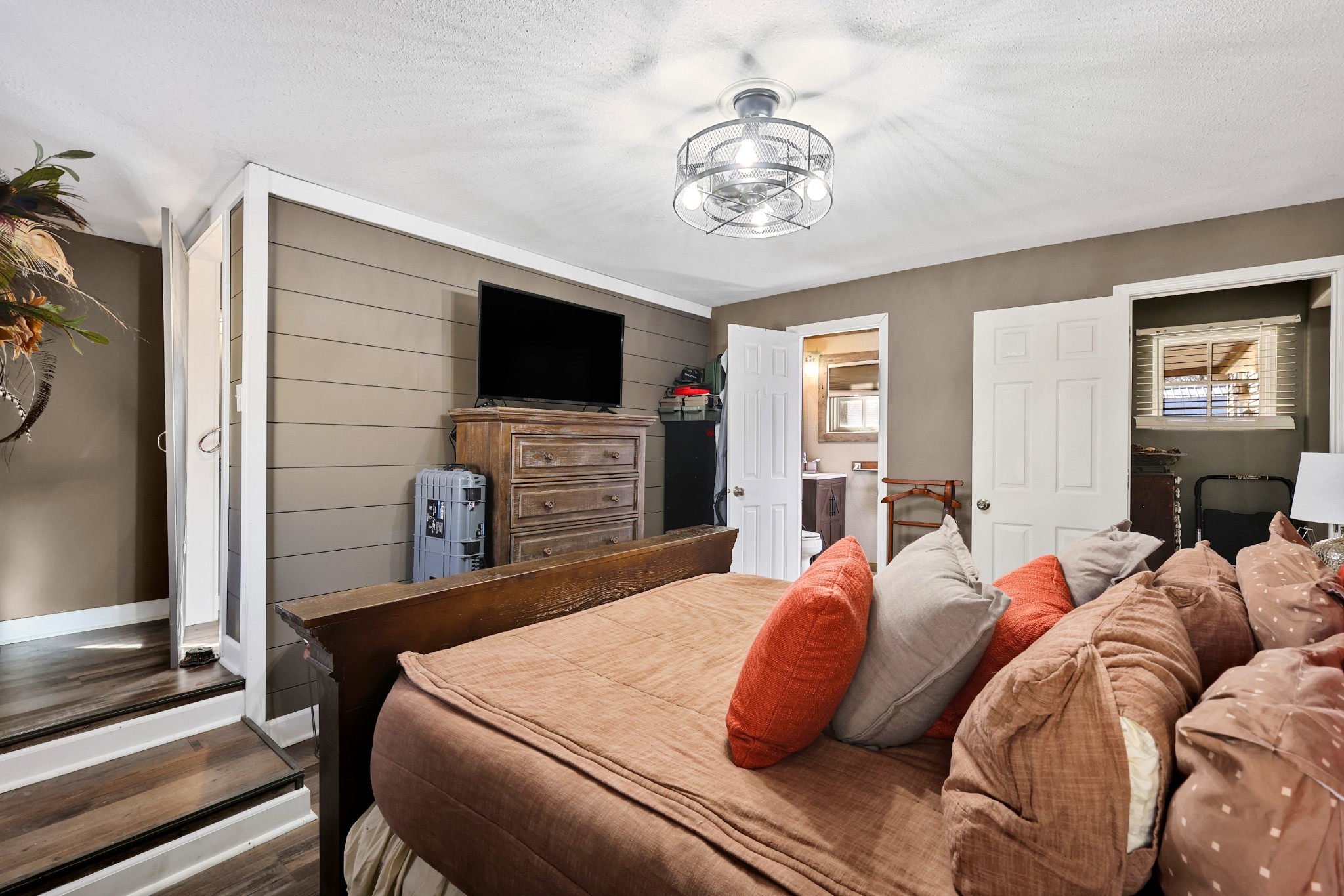 80 Woody Lane Springville, TN 38256 - Photo 13 of 31 a bedroom with a bed and a flat screen tv