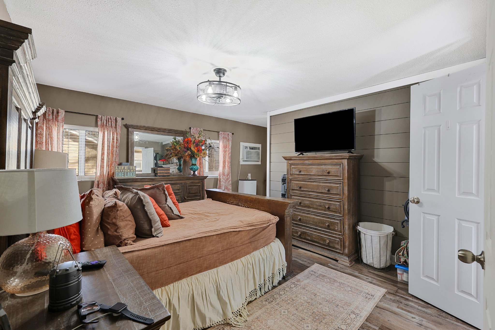 80 Woody Lane Springville, TN 38256 - Photo 14 of 31 a bedroom with a bed and a flat screen tv