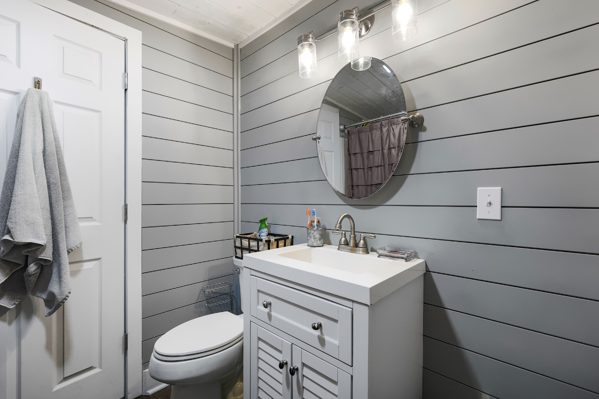 80 Woody Lane Springville, TN 38256 - Photo 20 of 31 a bathroom with a sink toilet and shower