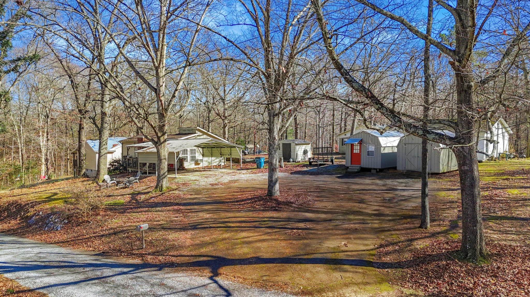 80 Woody Lane Springville, TN 38256 - Photo 2 of 31 a view of a town with large trees
