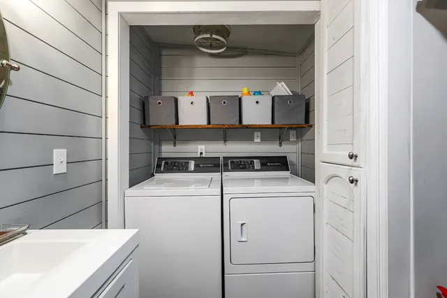 a utility room with dryer and washer