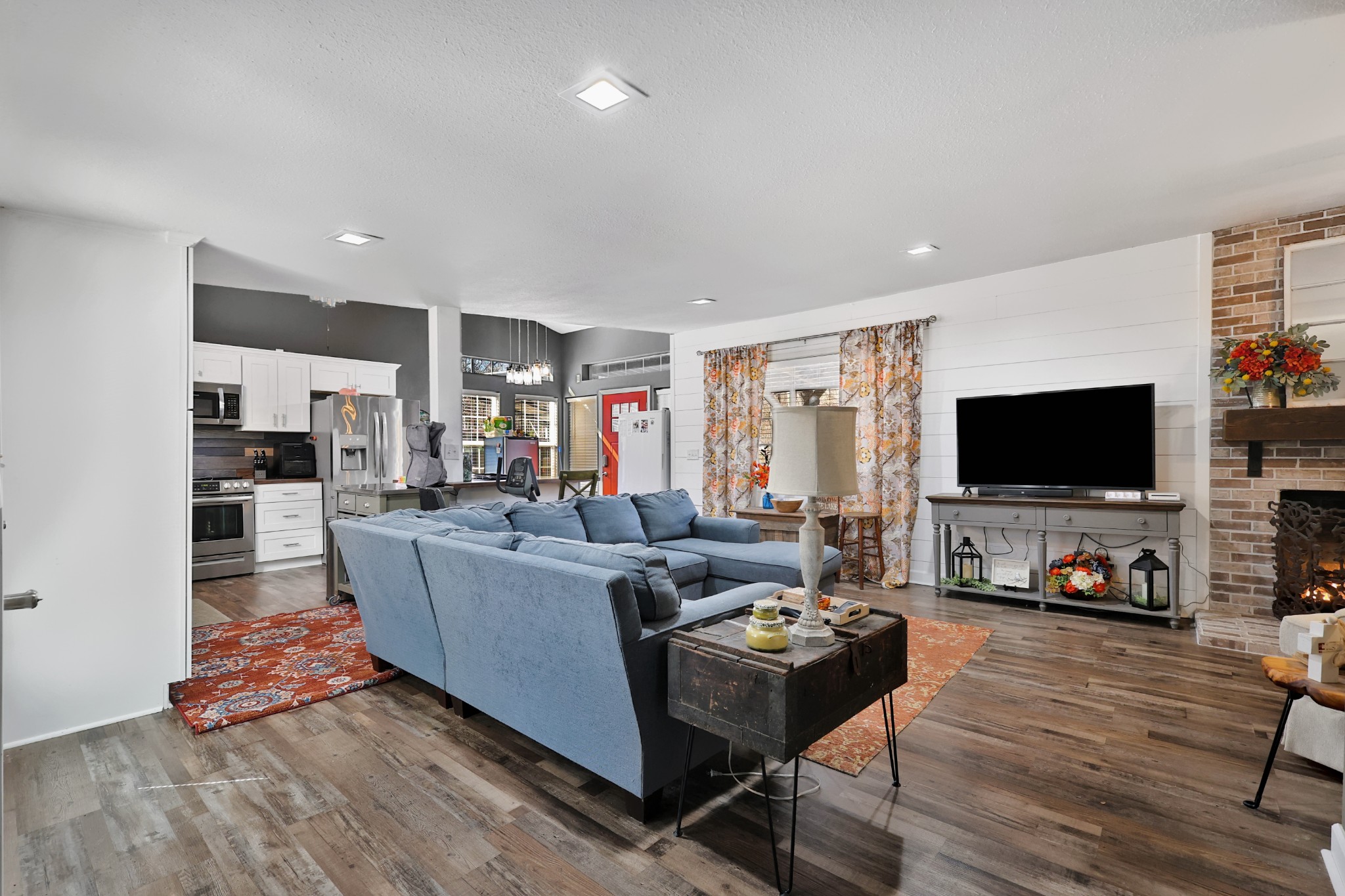 80 Woody Lane Springville, TN 38256 - Photo 24 of 31 a living room with furniture and a flat screen tv
