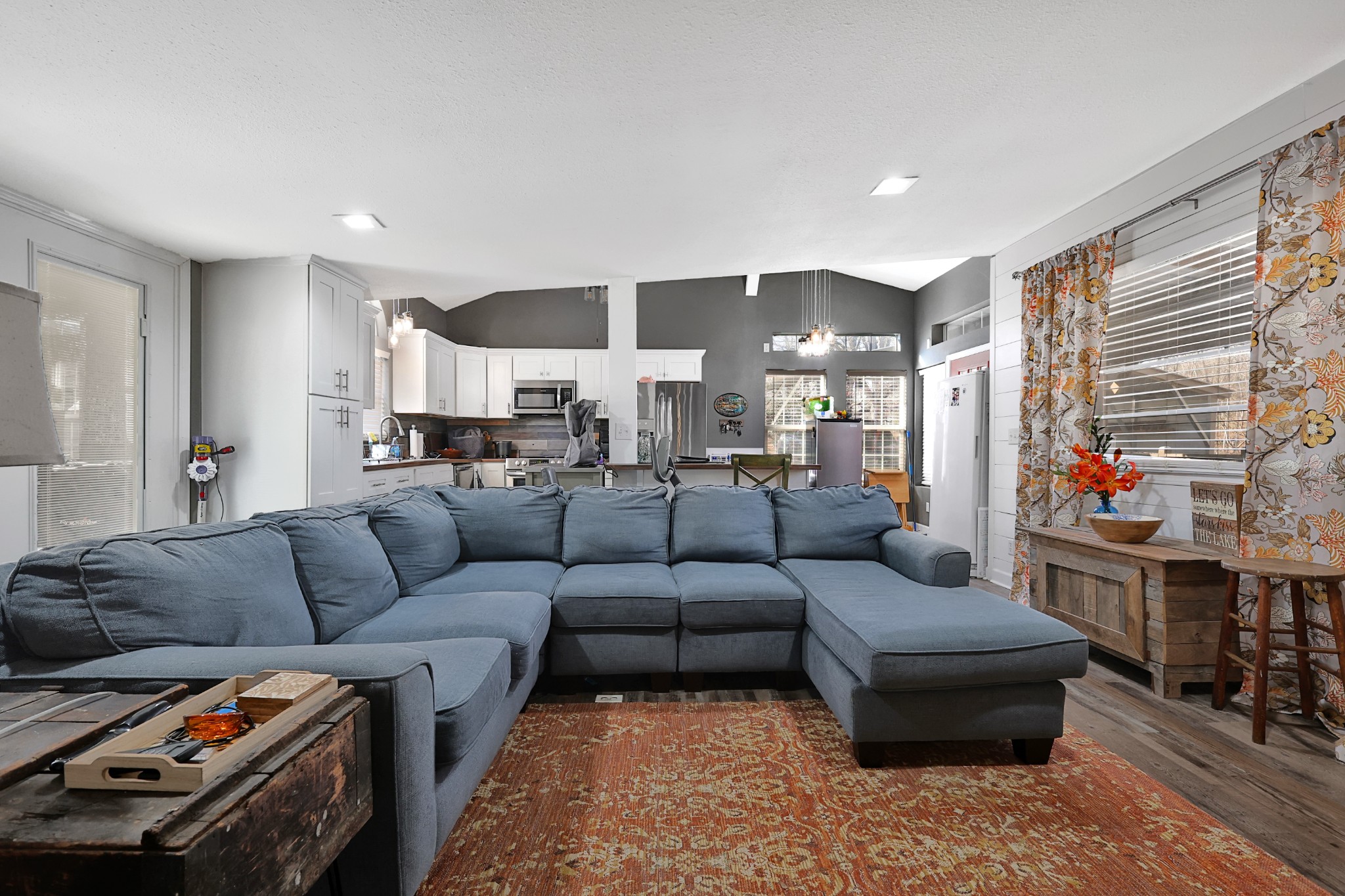 80 Woody Lane Springville, TN 38256 - Photo 25 of 31 a living room with furniture and a flat screen tv