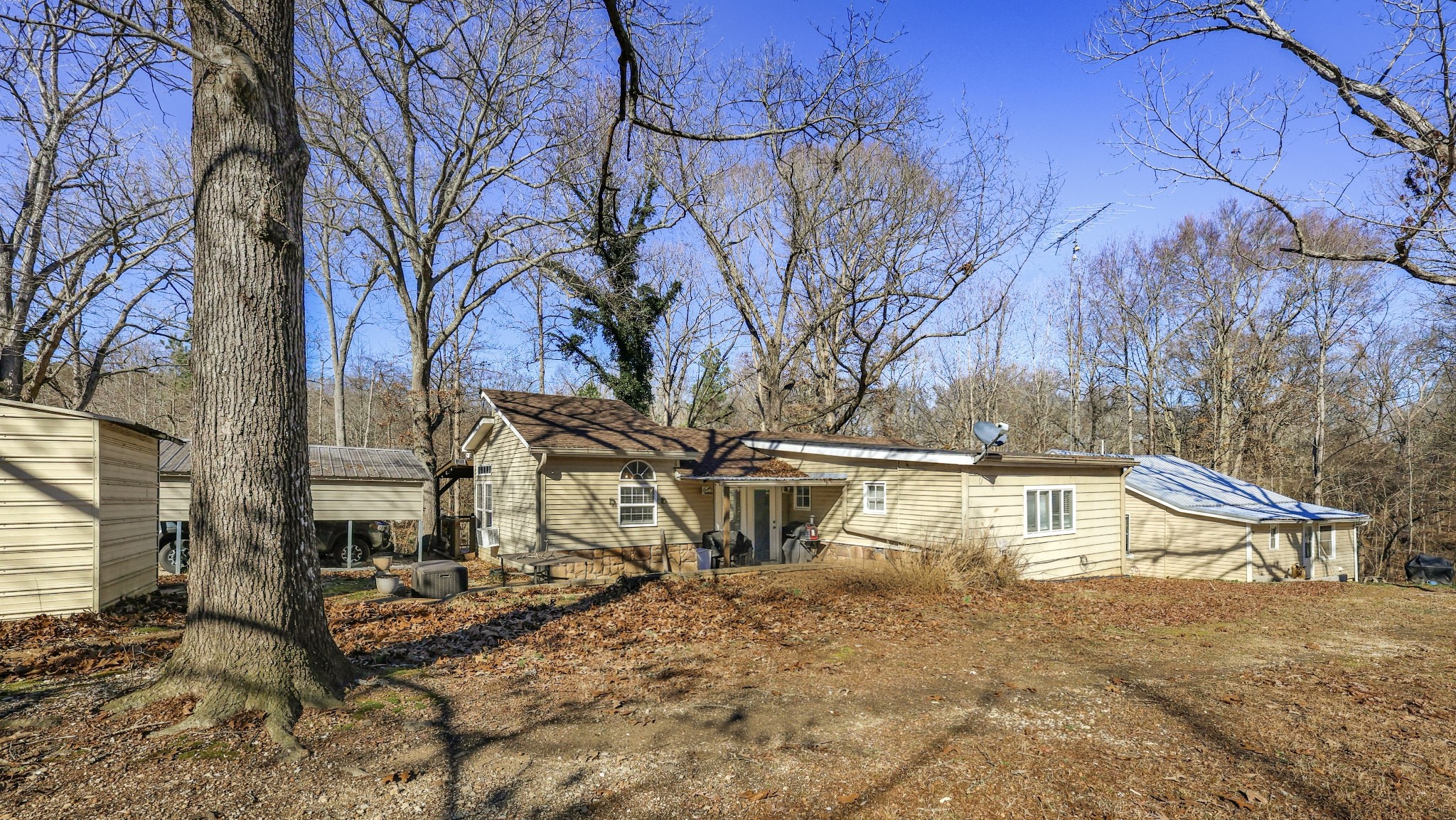 80 Woody Lane Springville, TN 38256 - Photo 30 of 31 a view of house with outdoor space