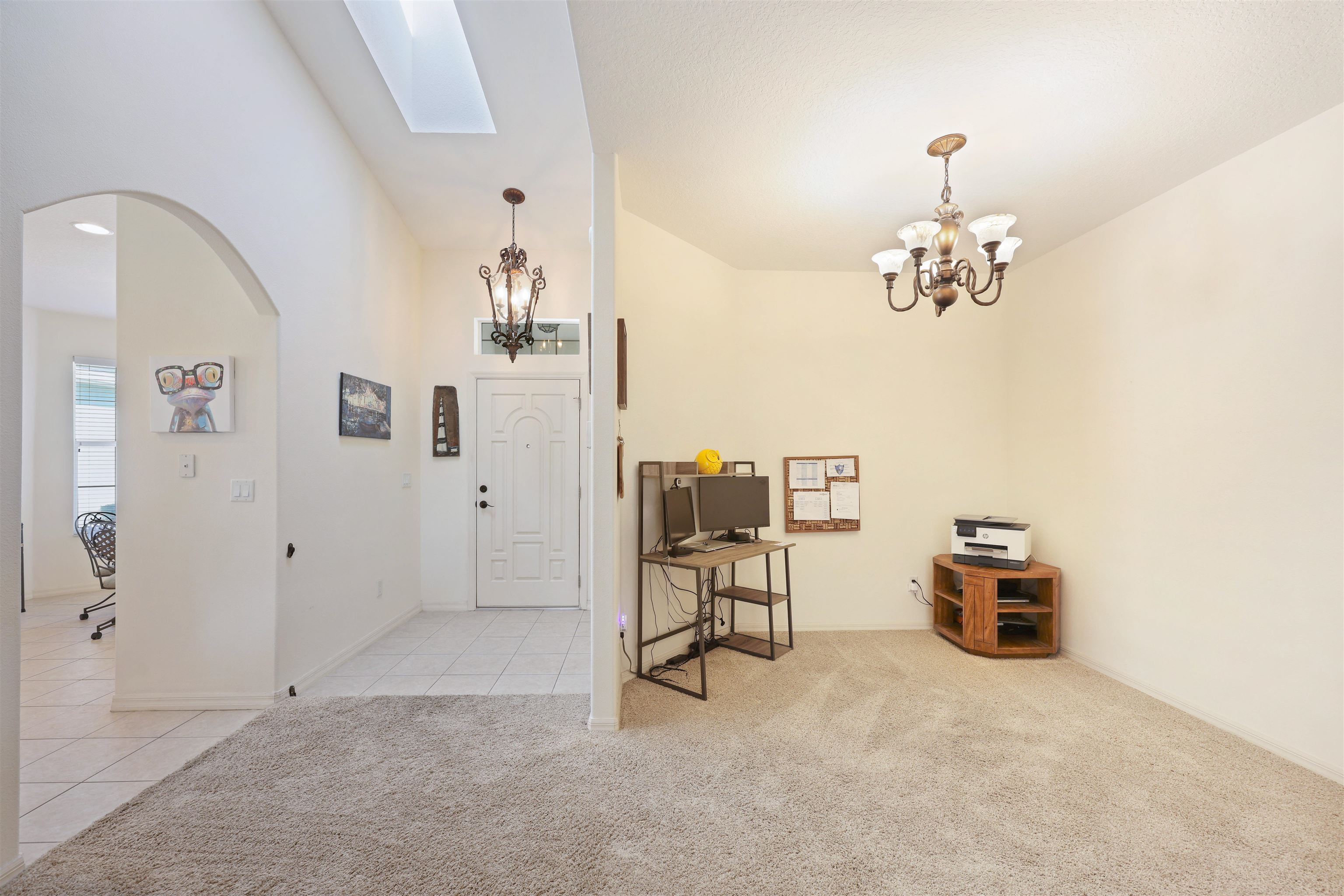 1017 Ridgewood Lane St. Augustine, FL 32086 - Photo 13 of 43 a view of a livingroom with a piano and wooden floor
