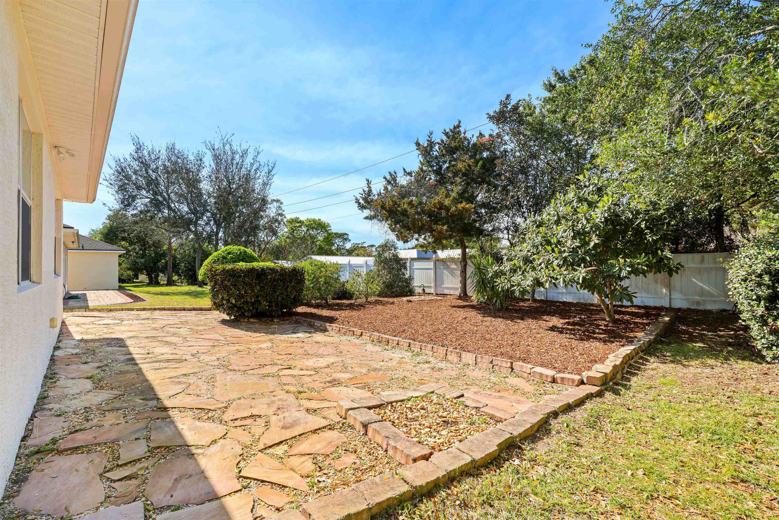 1017 Ridgewood Lane St. Augustine, FL 32086 - Photo 31 of 43 a view of a backyard of the house