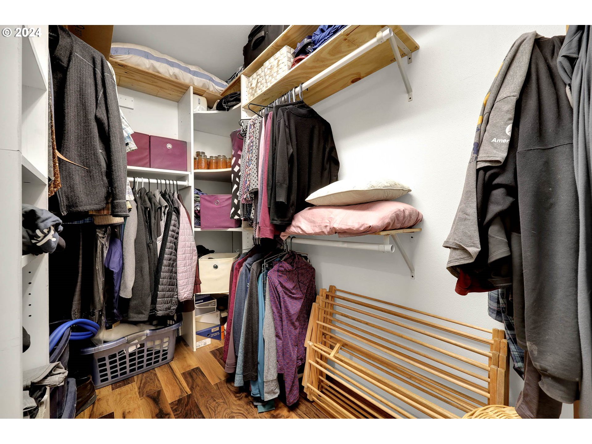 40089 Little Fall Creek Road Fall Creek, OR 97438 - Photo 23 of 40 a view of walk in closet with clothes and shoes