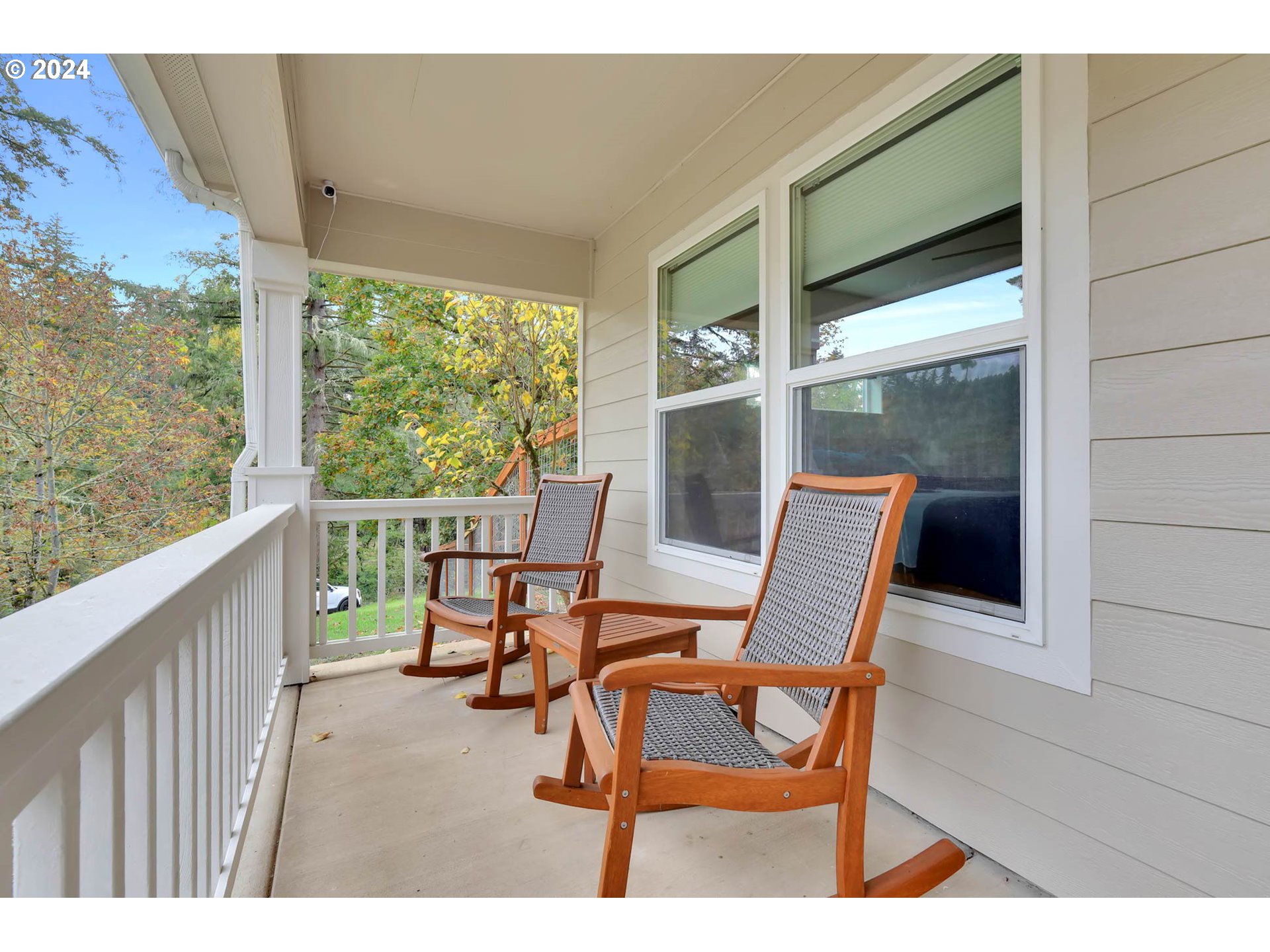 40089 Little Fall Creek Road Fall Creek, OR 97438 - Photo 5 of 40 a view of a chairs and table in the balcony