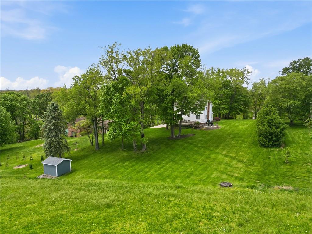 267 Forsythe Road Mars, PA 16046 - Photo 6 of 41 a view of a garden with a bench