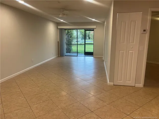 en empty room with windows