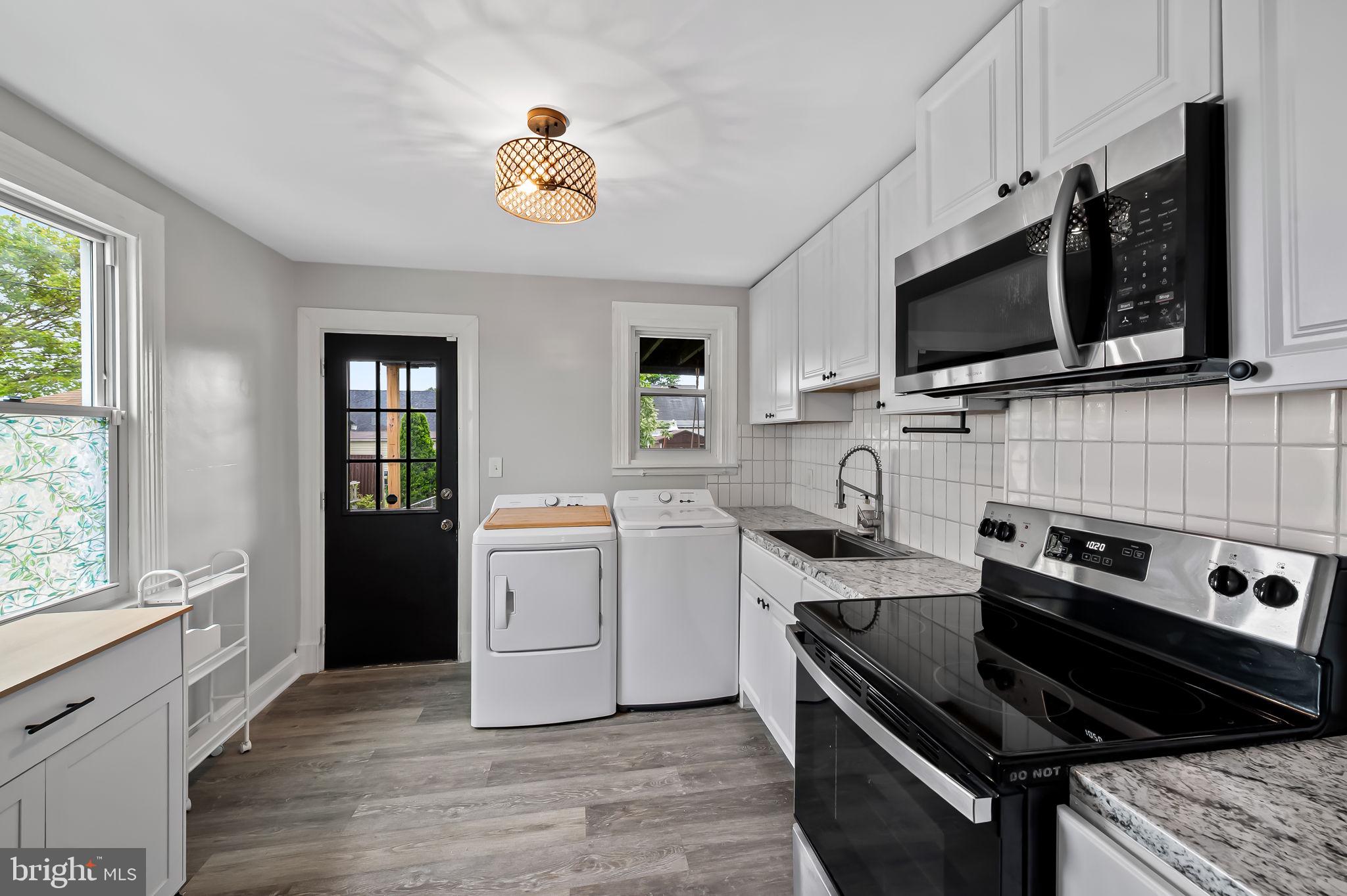 18 Crafton Road Baltimore, MD 21221 - Photo 3 of 22 Convenient Kitchen with laundry
