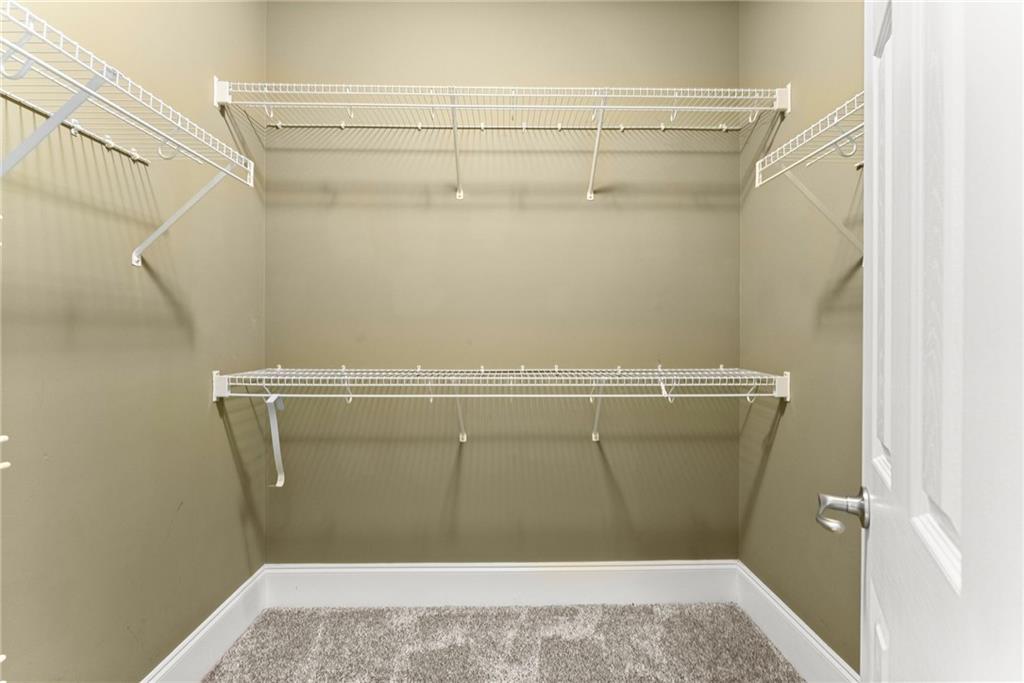 6643 Windvane Point Clermont, GA 30527 - Photo 27 of 88 a view of a room with racks
