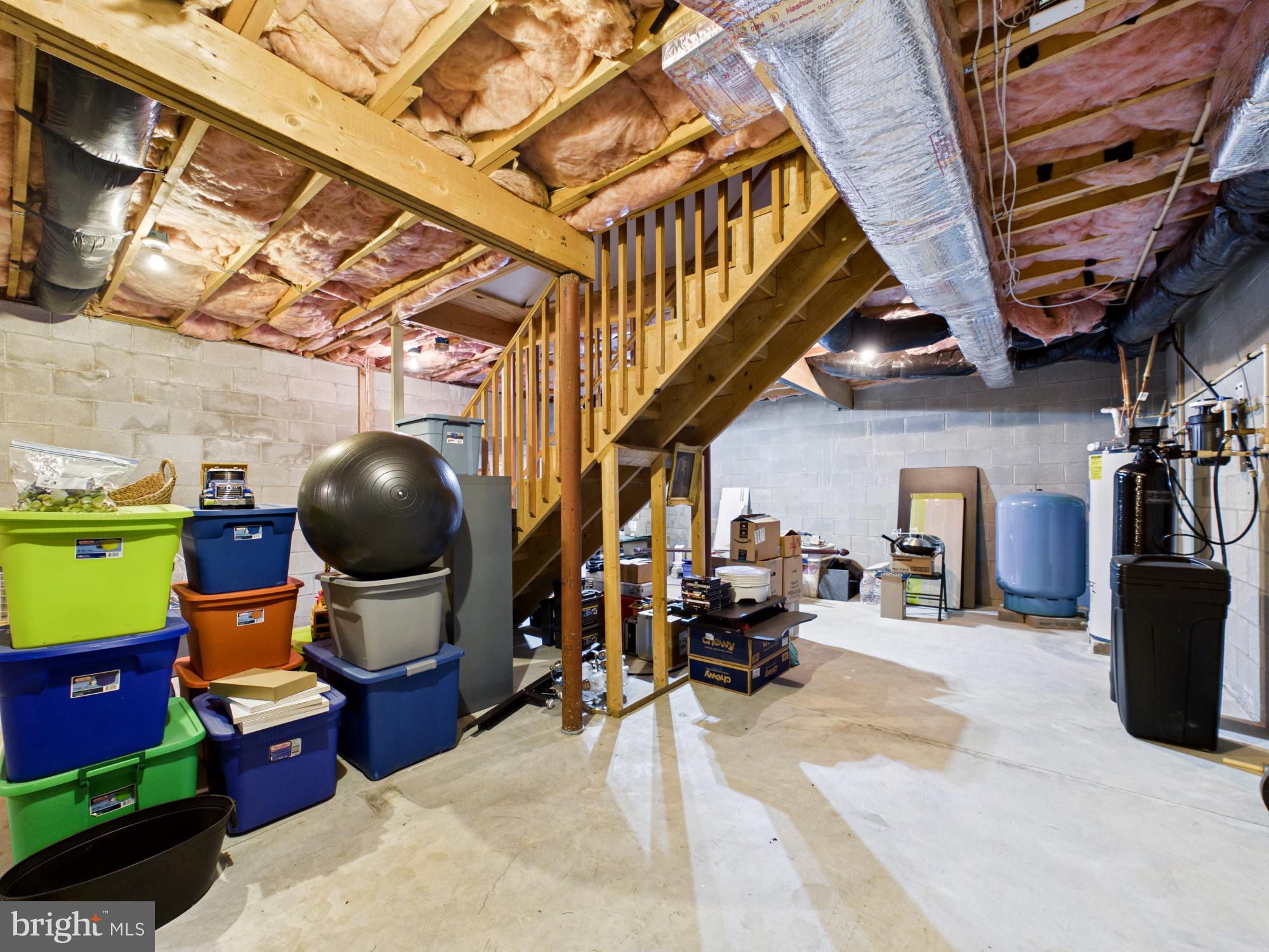 3298 Canterbury Road Milford, DE 19963 - Photo 40 of 74 Basement Storage & Stairs