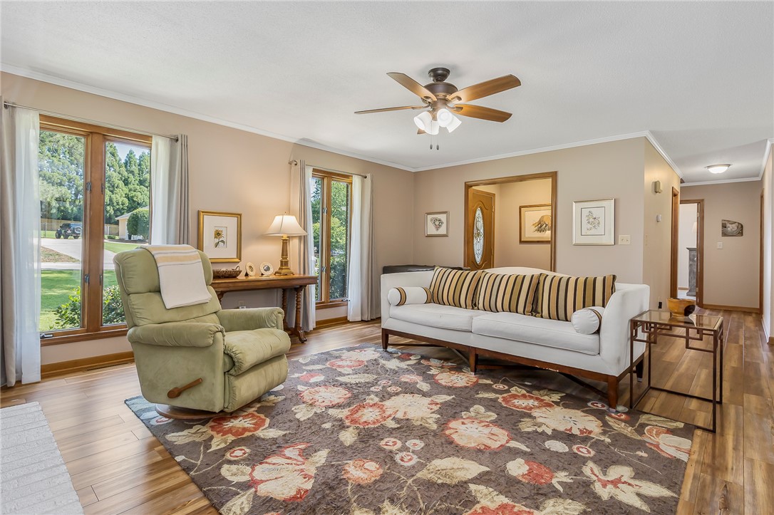207 Laurel Ridge Road Anderson, SC 29621 - Photo 11 of 50 A comforting living space features rich hardwood flooring and an inviting area rug underfoot.