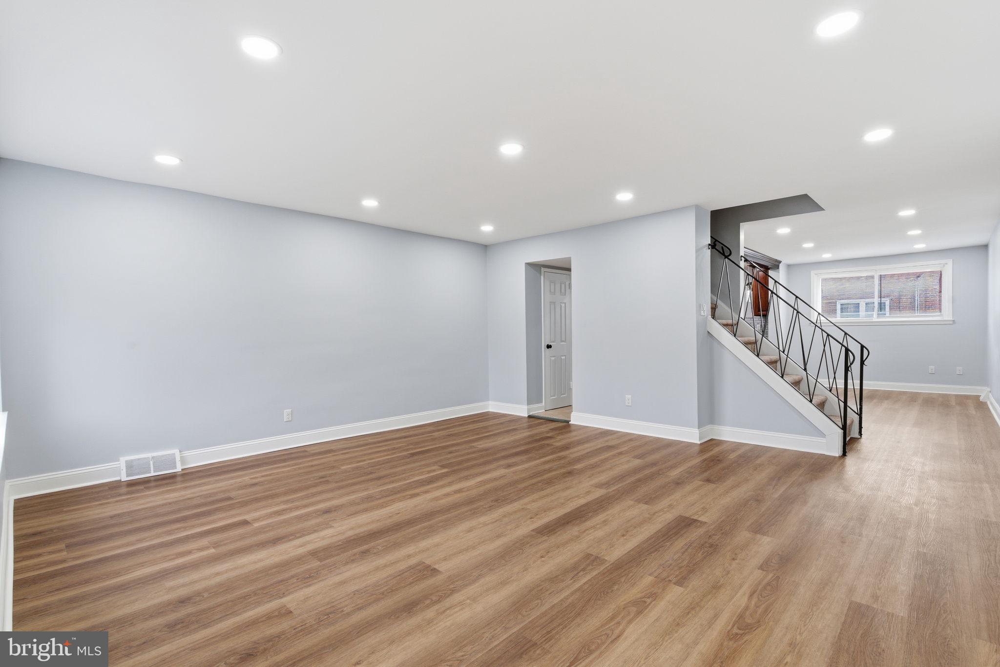 3728 West Country Club Road Philadelphia, PA 19131 - Photo 2 of 16 Spacious living area with new LVP flooring