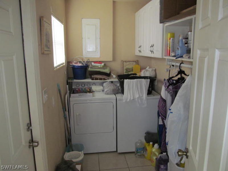 308 East Penn Road Lehigh Acres, FL 33936 - Photo 11 of 15 a room with storage and utility