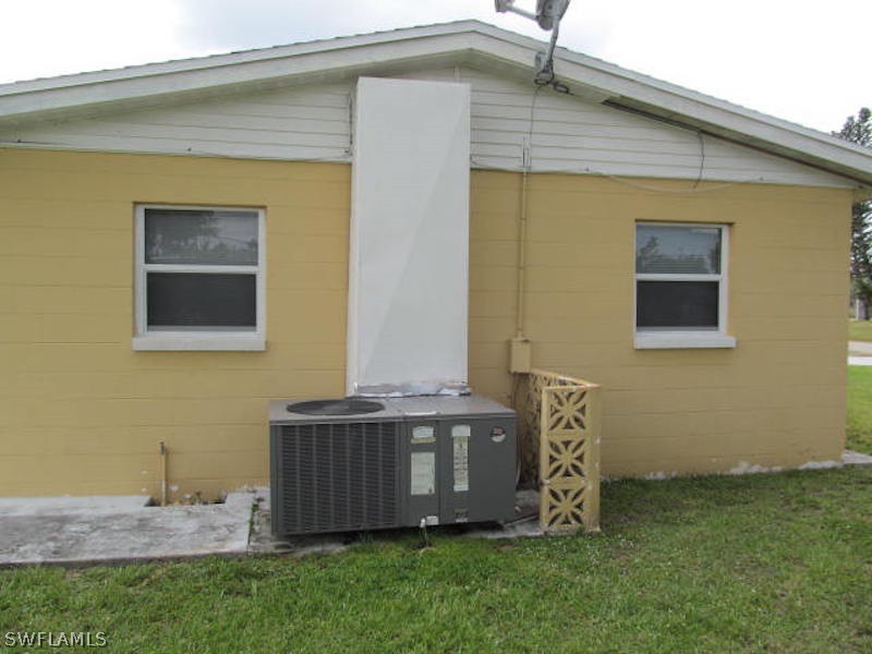 308 East Penn Road Lehigh Acres, FL 33936 - Photo 12 of 15 a view of front door of house