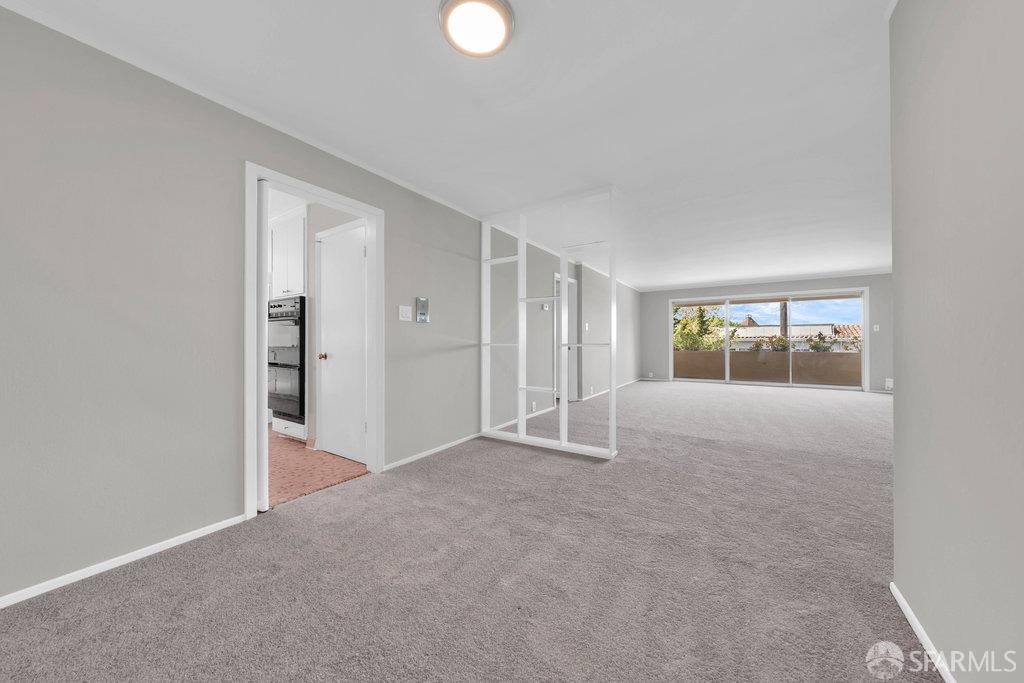 1401 Walnut Street, Unit 1B Berkeley, CA 94709 - Photo 16 of 53 a view of an empty room with a window