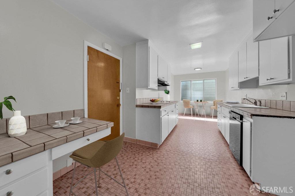 1401 Walnut Street, Unit 1B Berkeley, CA 94709 - Photo 19 of 53 a kitchen with stainless steel appliances granite countertop a sink stove and refrigerator
