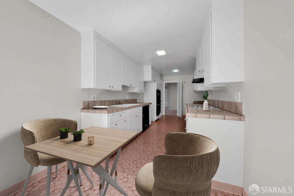 1401 Walnut Street, Unit 1B Berkeley, CA 94709 - Photo 22 of 53 a living room with kitchen and a couch