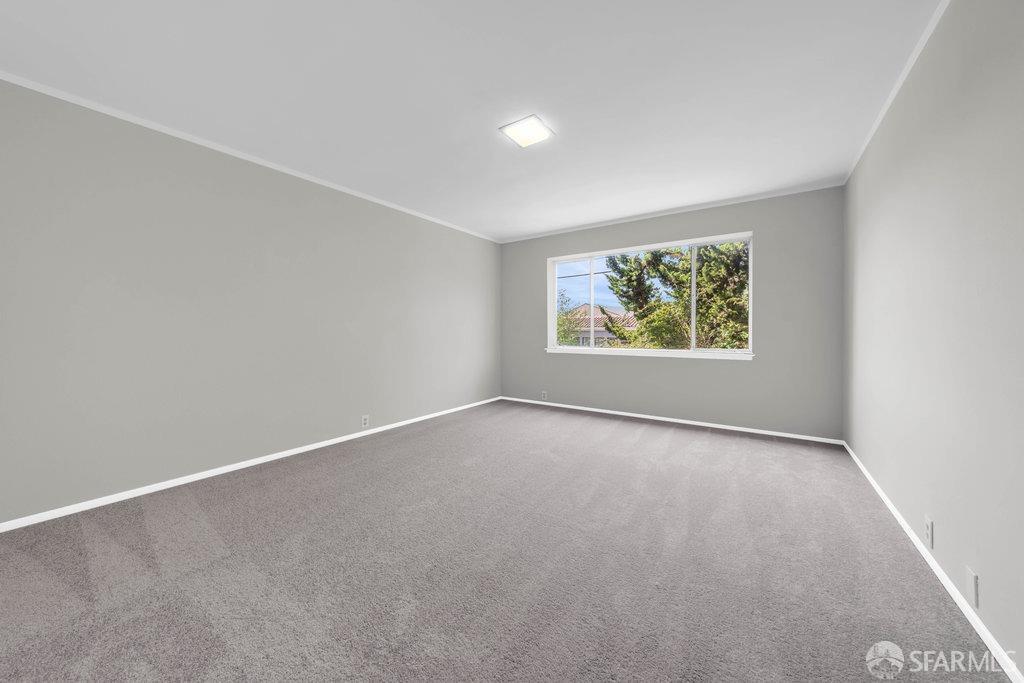 1401 Walnut Street, Unit 1B Berkeley, CA 94709 - Photo 25 of 53 an empty room with windows