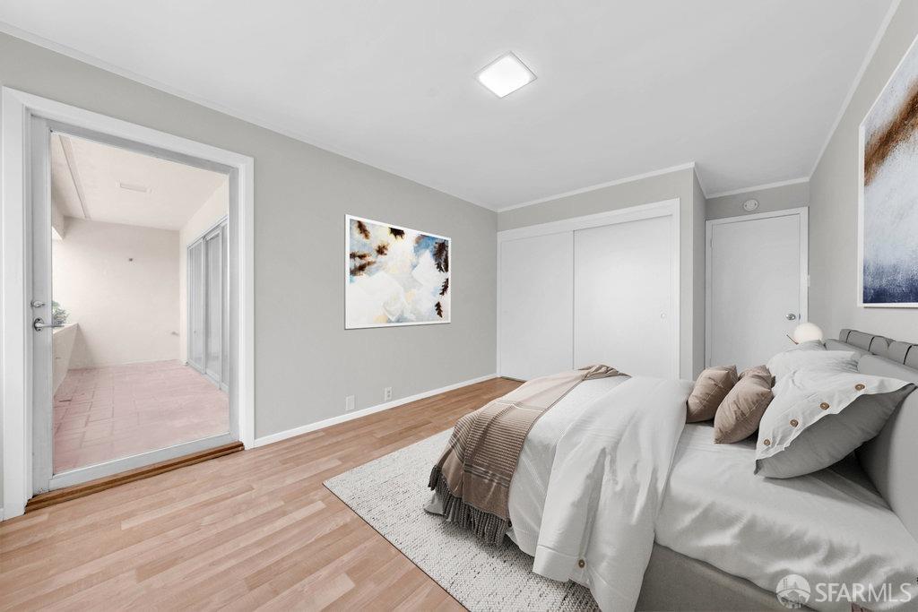 1401 Walnut Street, Unit 1B Berkeley, CA 94709 - Photo 33 of 53 a bedroom with bed and a painting on the wall