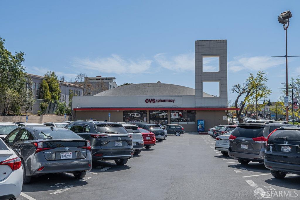 1401 Walnut Street, Unit 1B Berkeley, CA 94709 - Photo 48 of 53 a front view of a house with cars parked