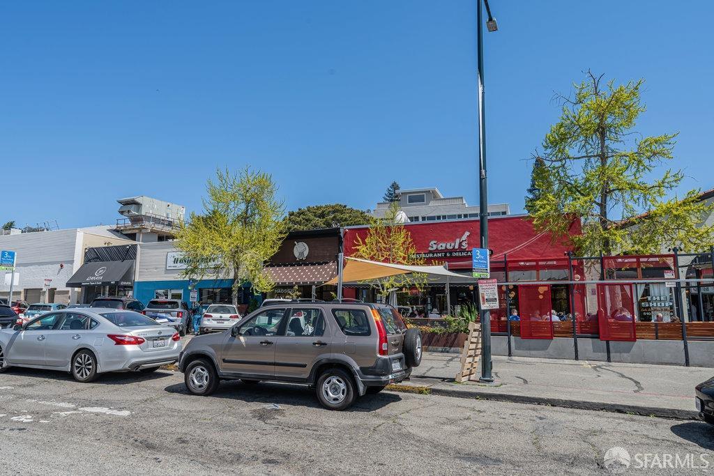 1401 Walnut Street, Unit 1B Berkeley, CA 94709 - Photo 50 of 53 a car parked in front of a building