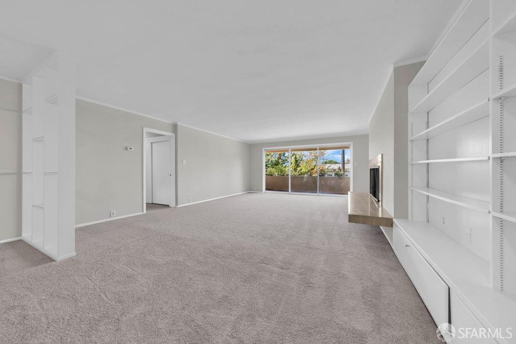 1401 Walnut Street, Unit 1B Berkeley, CA 94709 - Photo 9 of 53 a view of an empty room with a window