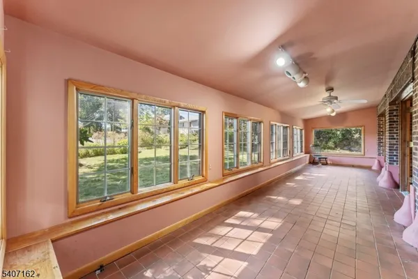 a view of a room with windows