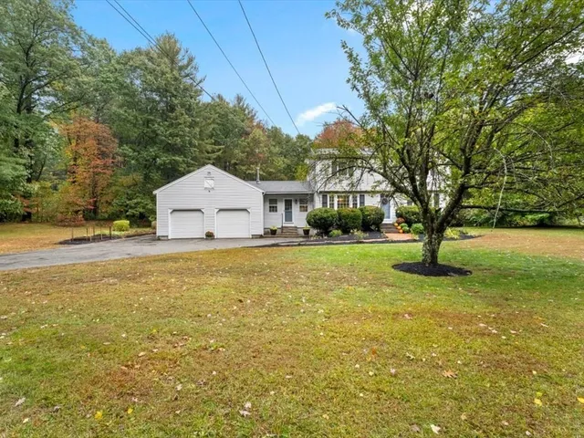 a house view with a garden space