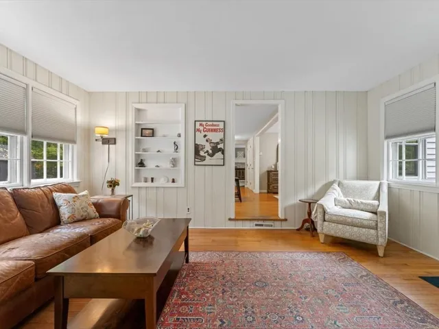 a living room with furniture and a couch