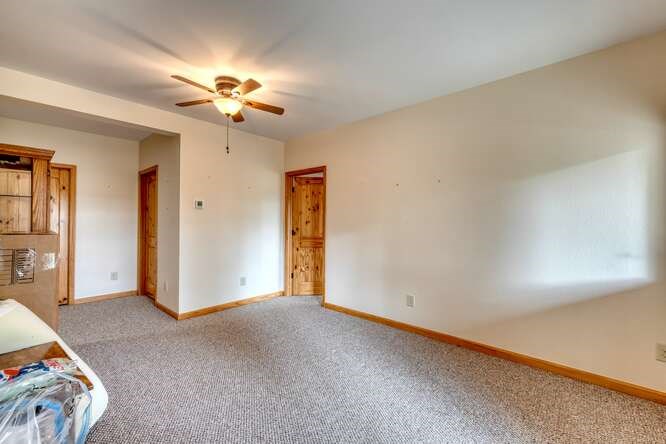 99 Old Possum Way Murphy, NC 28906 - Photo 25 of 54 a view of a livingroom with a chandelier fan