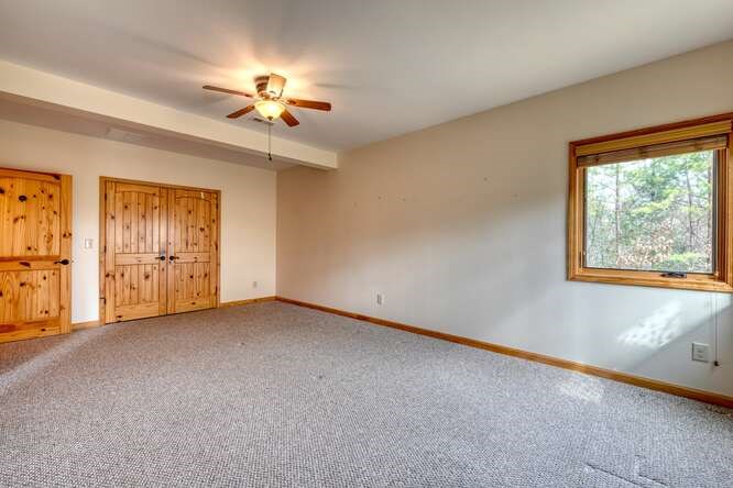 99 Old Possum Way Murphy, NC 28906 - Photo 29 of 54 a view of an empty room with a window
