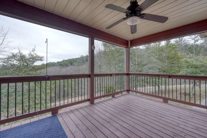 99 Old Possum Way Murphy, NC 28906 - Photo 32 of 54 a view of a balcony with wooden floor