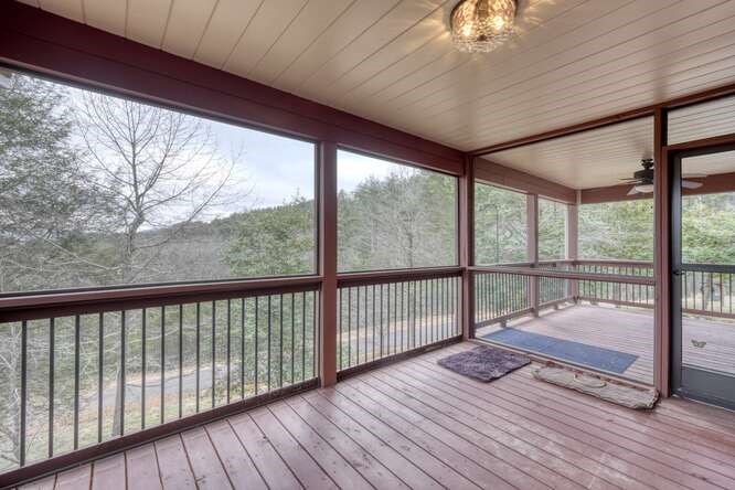 99 Old Possum Way Murphy, NC 28906 - Photo 37 of 54 a view of a balcony with wooden floor