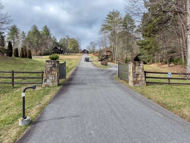 99 Old Possum Way Murphy, NC 28906 - Photo 48 of 54 a view of a street with houses on both side