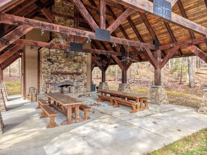 99 Old Possum Way Murphy, NC 28906 - Photo 52 of 54 a view of a patio with a table and chairs under an umbrella