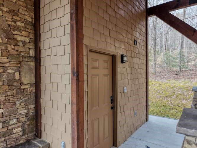 99 Old Possum Way Murphy, NC 28906 - Photo 53 of 54 a view of a brick house with a large window