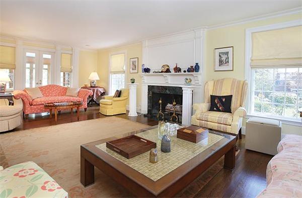 90 Baxter Road Brookline, MA 02445 - Photo 4 of 10 a living room with furniture and a fireplace