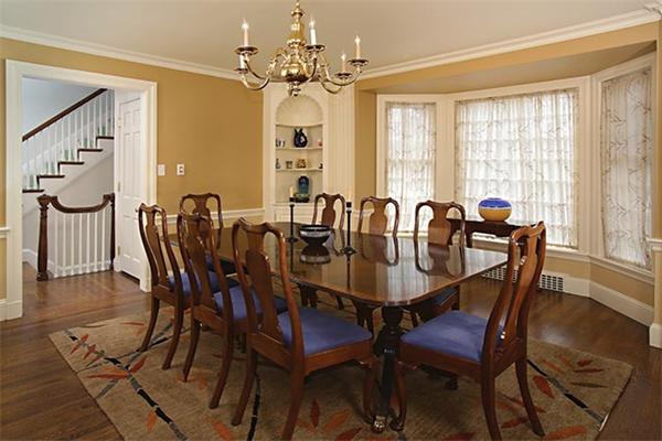 90 Baxter Road Brookline, MA 02445 - Photo 5 of 10 a view of a dining room with furniture window and wooden floor