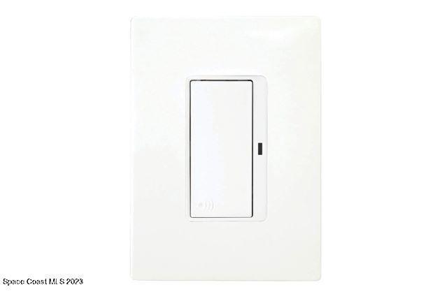 1090 Cherokee Road Southeast Palm Bay, FL 32909 - Photo 23 of 26 LIGHT SWITCH