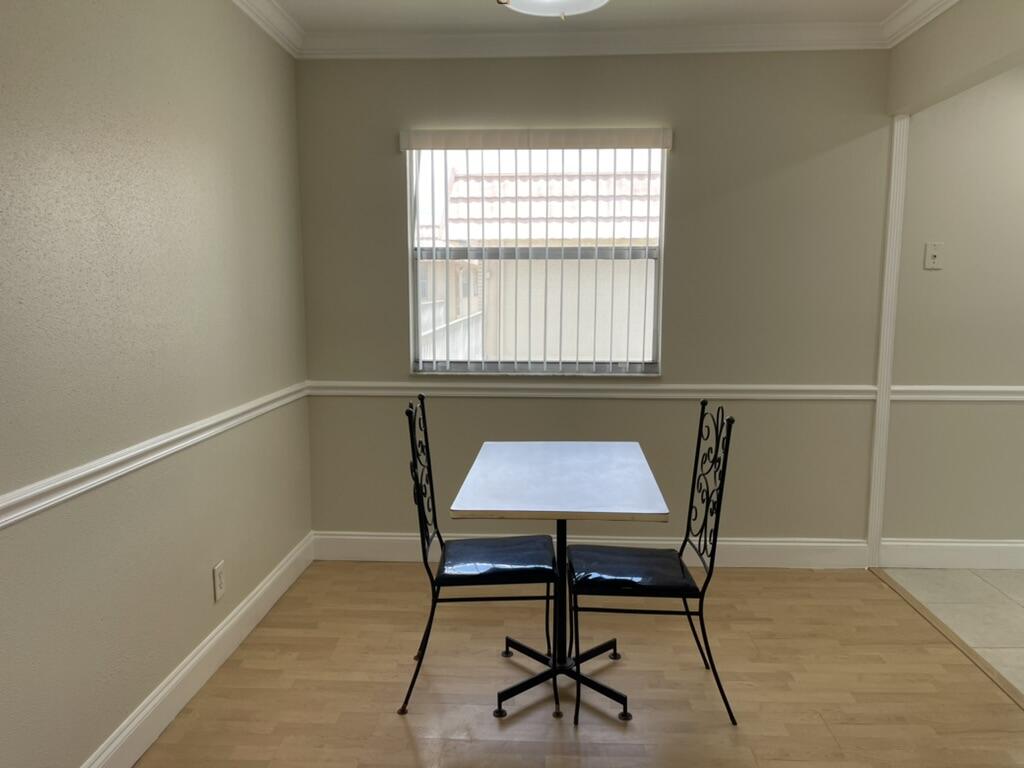 472 Saxony Way Delray Beach, FL 33446 - Photo 7 of 33 a view of a workspace with furniture and a window