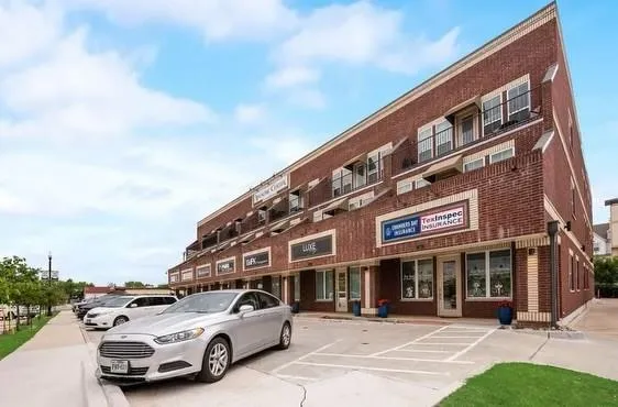 a car parked in front of a building