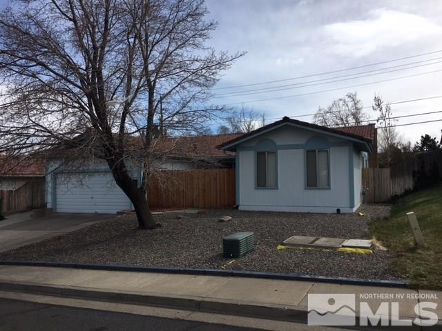 1346 Frontier Street Reno, NV 89503 - Photo 1 of 1 a front view of a house with a yard