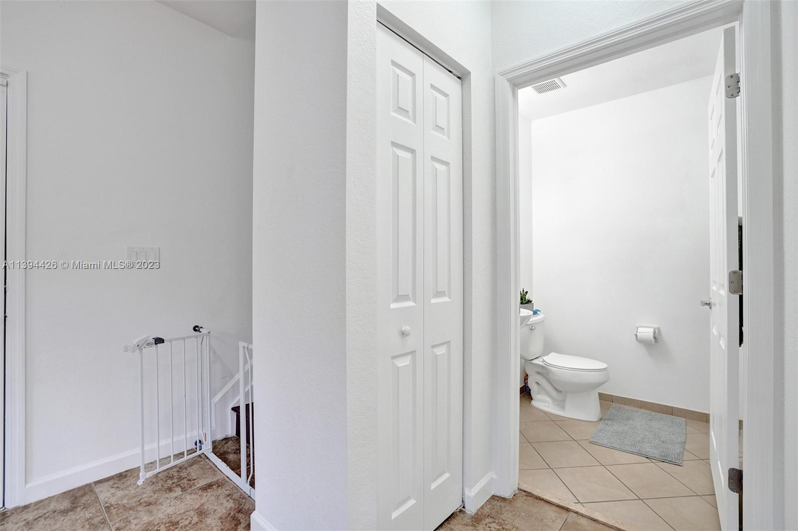 732 Southeast 33 Terrace Homestead, FL 33033 - Photo 12 of 65 a bathroom with a granite countertop sink a toilet and shower