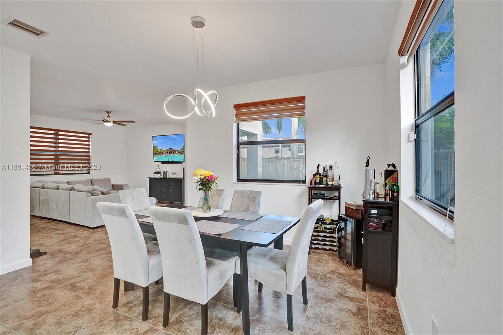 732 Southeast 33 Terrace Homestead, FL 33033 - Photo 15 of 65 a view of a dining room with furniture