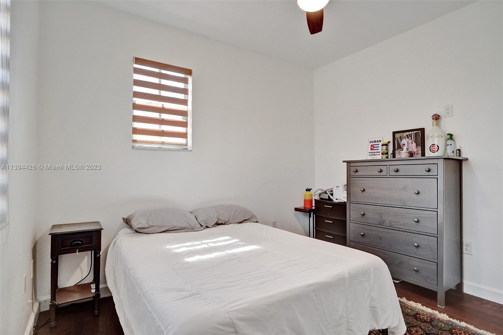 732 Southeast 33 Terrace Homestead, FL 33033 - Photo 30 of 65 a bedroom with a bed and a window