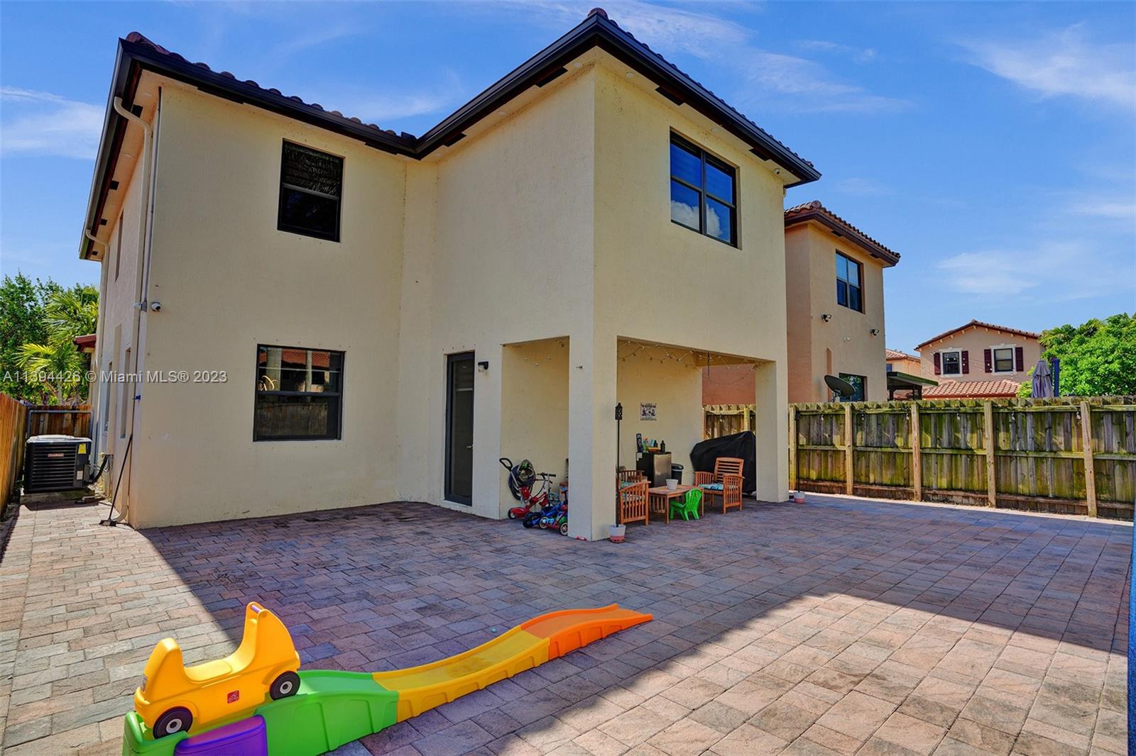 732 Southeast 33 Terrace Homestead, FL 33033 - Photo 55 of 65 a view of a house with swimming pool and sitting area